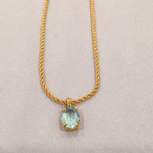 Gold neckless with Blue Topaz pendant top